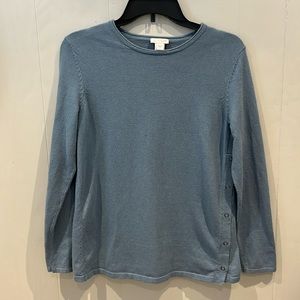 J.Jill scoop neck light blue sweater with five snap closure on left side.